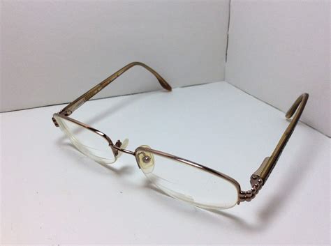 saks fifth avenue eyeglasses 135.